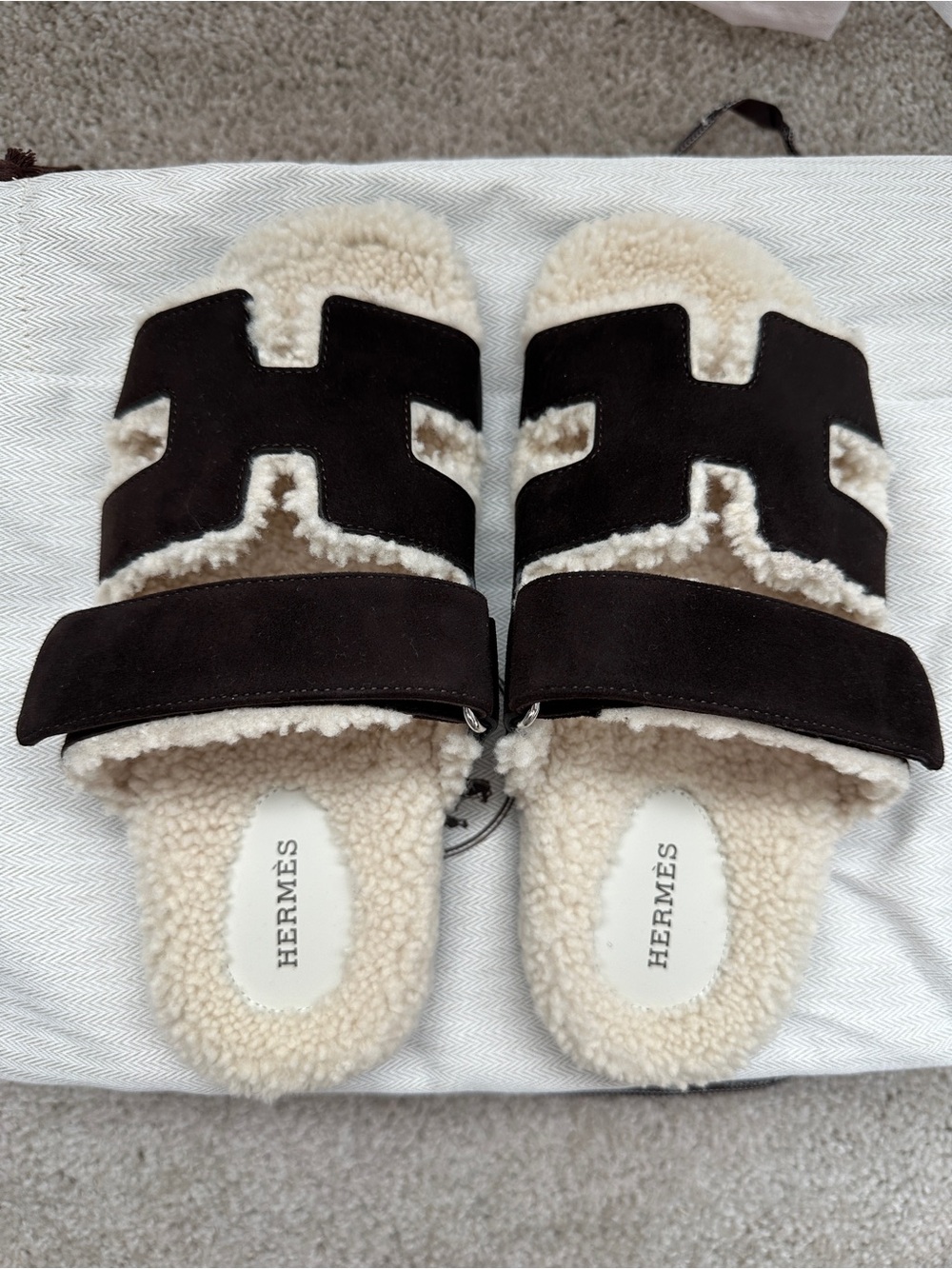 Hermes Shearling Chypre Sandals in Marron Ébène / Écru